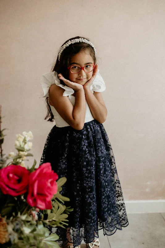 3- large white pearls on black headband